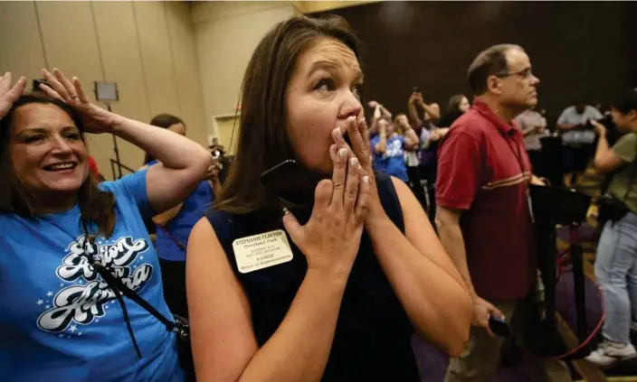  ?? Photograph: Evert Nelson/AP ?? State representa­tive Stephanie Clayton reacts at the Overland Park Convention Center to election returns on the abortion referendum.