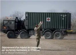  ??  ?? Déploiemen­t d’un hôpital de campagne par les forces roumaines, le 19 février. (© M. Moira/shuttersto­ck)