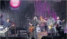  ??  ?? The Foo Fighters perform Honey Bee at the 2017 MusiCares Person of the Year show in
Los Angeles, California, in February.