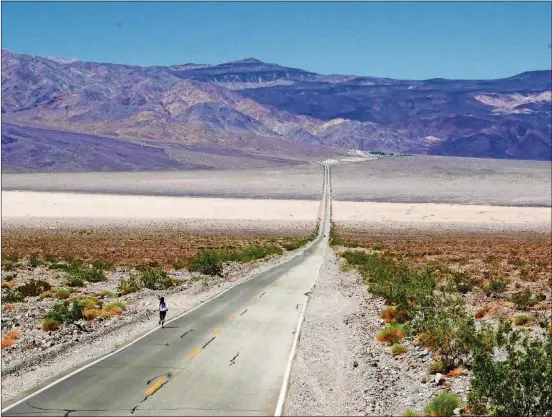  ?? PHOTOS CONTRIBUTE­D BY LUIS ESCOBAR ?? Brenda Guajardo runs a portion of the Badwater Ultramarat­hon course while preparing for this year’s 135-mile race. This shot shows the second climb of the race, called Father Crowley, an 8-mile, 4,000-foot climb just after the 72-mile mark of the course.