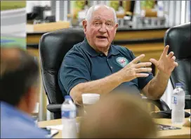  ?? AP FILE ?? U.S. Agricultur­e Secretary Sonny Perdue speaks during a roundtable in Ames, Iowa, last summer. The former governor of Georgia is widely traveled and many of his trips include stops in his home state.