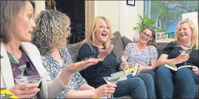  ??  ?? Left to right, Fiona Tulley, Caroline Glinka, Elaine Hunter, Louise Neuwirth and Inge Morrill share a laugh during their book group night