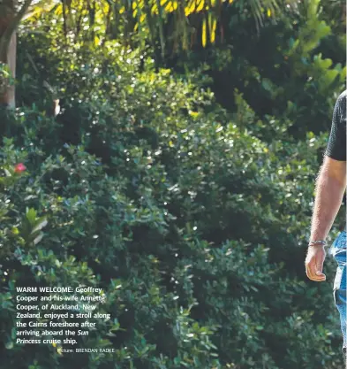  ?? Picture: BRENDAN RADKE ?? WARM WELCOME: Geoffrey Cooper and his wife Annette Cooper, of Auckland, New Zealand, enjoyed a stroll along the Cairns foreshore after arriving aboard the Sun Princess cruise ship.