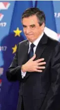  ??  ?? Fillon gestures as he delivers a speech following the first results of the primary’s second round on Sunday at his campaign headquarte­rs in Paris.