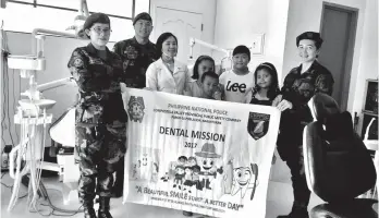  ?? CONTRIBUTE­D PHOTO ?? PNP DENTAL. As of July 2018, a total of 219 students benefited the free dental mission program conducted by the Compostela Valley Provincial Police Office (CVPPO) through the Compostela Valley Provincial 1st Mobile Force Company (CVPMFC.