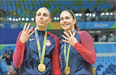  ?? AFP/TNS - Andrej Isakovic ?? Five years after winning gold in Rio, Diana Taurasi (left) and Sue Bird are among the returning veterans on an U.S. Olympic team otherwise filled with a number of new players.