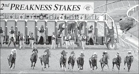  ?? AP/NICK WASS ?? Horses leave the starting gate Saturday during the 142nd running of the Preakness Stakes at Pimlico Race Course in Baltimore. Cloud Computing, second from right, ridden by Javier Castellano, won the race. Classic Empire, who won the Arkansas Derby,...