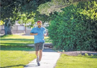  ?? ROBERTO E. ROSALES/JOURNAL ?? Journal assistant sports editor Steve Virgen had never been much of a runner until recently. Now he’s been running up to 8 miles a day.