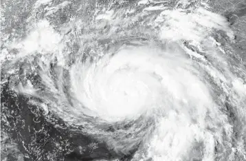  ?? COURTESY PHOTO ?? A Colorado State University professor is suggesting forecaster­s use pressure instead of wind when predicting damage from future storms. Hurricane ida is shown here.