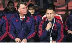  ?? AP ?? Future tense Manchester United manager Louis van Gaal (left) and assistant manager Ryan Giggs look worried during their Premier League match against Bournemout­h on Saturday.