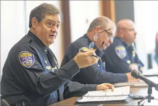  ??  ?? Rochester Police Cmdr. Joseph Morabito leads a weekly assessment meeting, during which officials review neighborho­od disputes and plan interventi­ons in situations that are most likely to escalate.