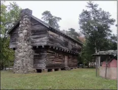  ??  ?? A restored pioneer-era blockhouse stands at Cadron Settlement Park on the Trail of Tears.