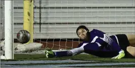  ?? ?? Ramona goalie Marissa Betancourt dives but can’t quite reach a shot by North’s Lavi Vaipulu (not pictured) that gave the Huskies a 2-1 second-half lead at Ramona High.