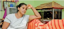  ??  ?? Rasin's pregnant wife Dipani: She unsuccessf­ully tried to call her husband on his mobile phone after he was taken away. Pix by Ishanka Sunimal