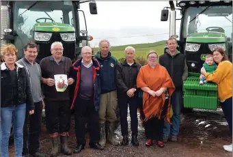  ?? Photos by Declan Malone ?? Ready for road in Ardamore, Lios Póil, in support of the West Kerry tractor run: Kitty Ingram, Tomás Devane, Seamus Devane, John Patrick O’Sullivan, Colm Murphy, Jimmy Fitzgerald, Mary Devane, Denis Devane, baby Alan Devane and Clare Devane.