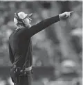  ?? RICH SCHULTZ/AP ?? Eagles linebacker­s coach Nick Rallis gestures during a preseason NFL football game against the Steelers on Aug. 12, 2021.