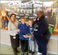  ?? FRAN MAYE — DIGITAL FIRST MEDIA ?? Pictured from left: Susan McArdle, principal of New Garden Elementary School, Brandt Berger, Charlie Westphal, and Bobbie Butcher of His Mission Homeless Shelter in Kennett Square.