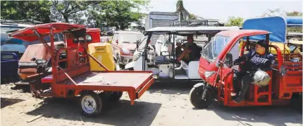  ?? (Noel B. Pabalate) ?? ₱2,500-PENALTY – An assortment of three-wheeled vehicles are brought to the Manila Traffic and Parking Bureau (MTPB) impounding area in Smokey Mountain, Tondo, Manila, after authoritie­s started the crackdown on e-bikes, e-trikes, and tricycles playing major roads on Wednesday, April 17, 2024.