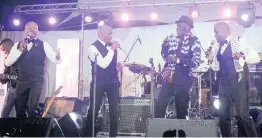  ??  ?? COLLABORAT­ION: Afro Tenors together with Oliver Mtukudzi had the patrons asking for more.