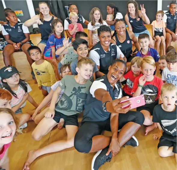  ?? Photo: World Rugby ?? Overseas-based Fiji Airways Fijiana squad member Mereseini Leivere takes a selfie with fellow teammates.