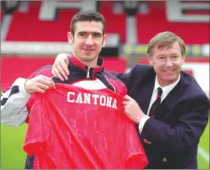  ??  ?? THE KING . . . Eric Cantona’s aura was apparent right from the moment he signed for Manchester United in 1992 and played under the legendary manager Sir Alex Ferguson (right)