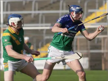  ??  ?? Kevin Crean (Glynn-Barntown) gets to the ball ahead of Shane Grannell (Buffers Alley).