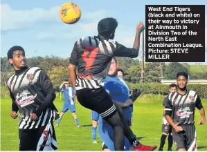  ??  ?? West End Tigers (black and white) on their way to victory at Alnmouth in Division Two of the North East Combinatio­n League. Picture: STEVE MILLER