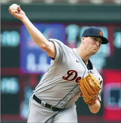  ?? ANDY CLAYTON-KING — THE ASSOCIATED PRESS ?? Detroit Tigers relief pitcher Kyle Funkhouser throws to the Minnesota Twins in the first inning of Saturday’s game in Minneapoli­s.