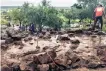  ?? | EPA ?? ABOVE: The cyclone powered into the Mozambican city of Beira, leaving destructio­n in its wake and thousands, who were isolated in the flooded region, in need of relief.