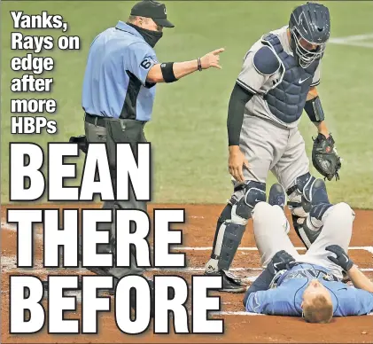  ?? Getty Images ?? THAT’LL LEAVE A MARK: The Rays’ Austin Meadows hits the dirt after getting plunked by Jordan Montgomery over the weekend. The Yankees and Rays face each other again this weekend, and tensions are already high.