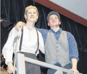  ?? CONTRIBUTE­D PHOTO ?? Cian Mccarron, left, as Crutchy, and Gabe Purdy, as Jack Kelly, take part in a rehearsal for CEC’S production of Newsies, which opens March 30.