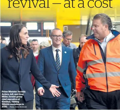  ?? Photo / Peter McIntosh ?? Prime Minister Jacinda Ardern, left, and Greg Miller, former group chief executive of KiwiRail, visiting Hillside workshops in 2020.