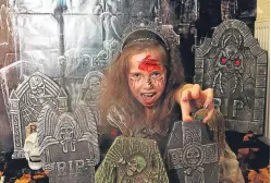  ?? Picture: Mhairi Edwards. ?? Amy Campbell, 10, gets into the spirit of things in the charity Halloween display.