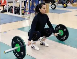  ?? Agence France-presse ?? Taiwan weightlift­er Kuo Hsing-chun seen during a training session at the National Sports Training Centre in Kaohsiung.