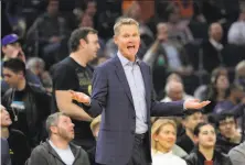  ?? Carlos Avila Gonzalez / The Chronicle ?? Steve Kerr routinely has gone without a tie during his time on the bench as the Warriors’ head coach.