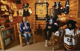  ?? Scott Takushi ?? The Associated Press Sisters Marissa, left, and Hannah Brandt pose in their family home in Vadnais Heights. Minn. They will be playing in the Winter Olympics in women’s hockey.