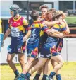  ?? Picture: AAP/Renae Droop ?? WINNERS: The Mustangs U18s celebrate their round one win.