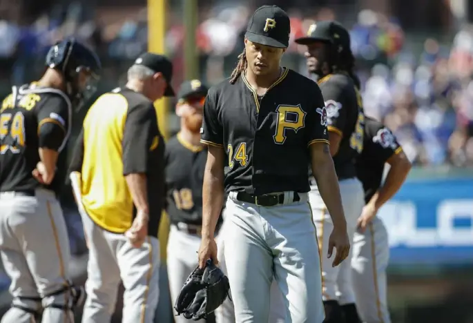  ?? The Associated Press ?? Chris Archer struck out 10 over 6-plus scoreless innings but saw his quality start go to waste as the Pirates fell to the Cubs Friday at Wrigley Field, 4-3.
