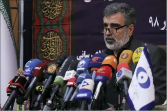  ?? ATOMIC ENERGY ORGANIZATI­ON OF IRAN VIA AP ?? In this photo released by the Atomic Energy Organizati­on of Iran, spokesman of the organizati­on Behrouz Kamalvandi speaks in a news briefing in Tehran, Iran, Saturday. Iran has begun injecting uranium gas into advanced centrifuge­s in violation of its 2015nuclea­r deal with world powers, Kamalvandi said.