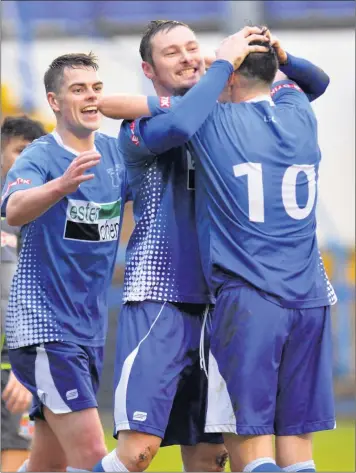  ??  ?? Striker Tim Grice, centre, is expected to be fit for Tuesday’s big derby game against local rivals Newcastle Town at Harrison Park.