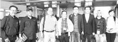  ??  ?? From left: Dalinting, Masiung, Abidin, Ginibun, Phoong, Tan, Sainin and China Consul to Sabah Zhong Jin before boarding their flight to China.