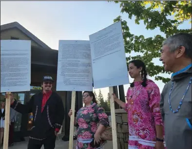  ?? Photo by Sharon Lungo ?? PROTESTING—Left to right, Michael Thomas (of Utqiagvik), Pangaanga Pangawyi (Sivungaq), Aklaasiaq Ahmasuk (Sitnasuaq) and Bivers Gologergen (Sivungaq) joined protesters in Menlo Park, CA to voice their concerns over potential health impacts on humans and marine life, and a lack of meaningful consultati­on with those who rely on the ice for subsistenc­e activities.