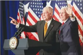  ?? COOPER NEILL / THE NEW YORK TIMES ?? Rep. Pete Sessions, R-texas, introduces Vice President Mike Pence during a campaign event Tuesday in Dallas. Party leaders are building a firewall around a few dozen purple districts, and cutting off some of their own candidates who appear unable to win.