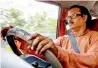  ??  ?? Dipak Das driving his vehicle on a Kolkata road.