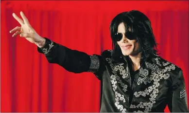  ?? — GETTY IMAGES FILES ?? Michael Jackson, who died in 2009, left a mountain of debt. A Las Vegas show, a new album and a DVD will help ease some of the burden.