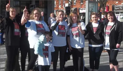  ??  ?? Dundalk Women’s Aid members and supporters at the One Billion Rising Campaign in Market Square.