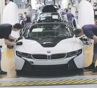  ?? Picture: Bloomberg ?? FACE OFF. The court had no problem with BMW providing the services of tax consultant­s to expatriate employees, but Sars sees the provision of such services as a taxable fringe benefit.