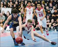  ?? SARAH GORDON/THE DAY ?? St. Bernard’s Max Lee (5) and Woodstock’s Cole Hackett dive for a loose ball during Wednesday’s ECC Division II tournament title at Waterford. The No. 1 Saints 51-45 for their second straight title.