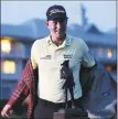  ?? Gerry Broome / Associated Press ?? Webb Simpson poses with the championsh­ip trophy after winning on Sunday.