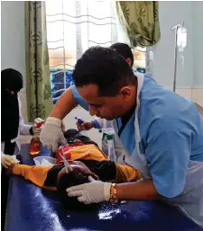  ??  ?? A Yemeni child receives treatment after he was reportedly injured in a Saudi-led coalition air strike. Photo: Getty